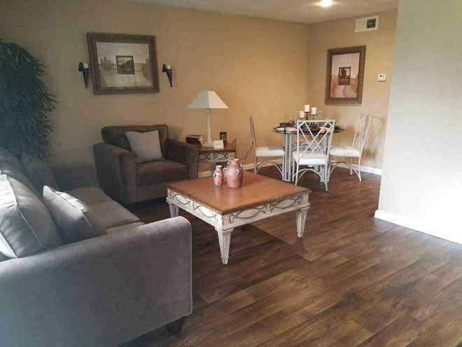 a living room with couches and a coffee table