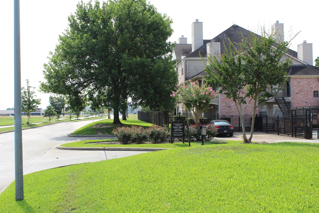 a neighborhood with houses and trees and a street