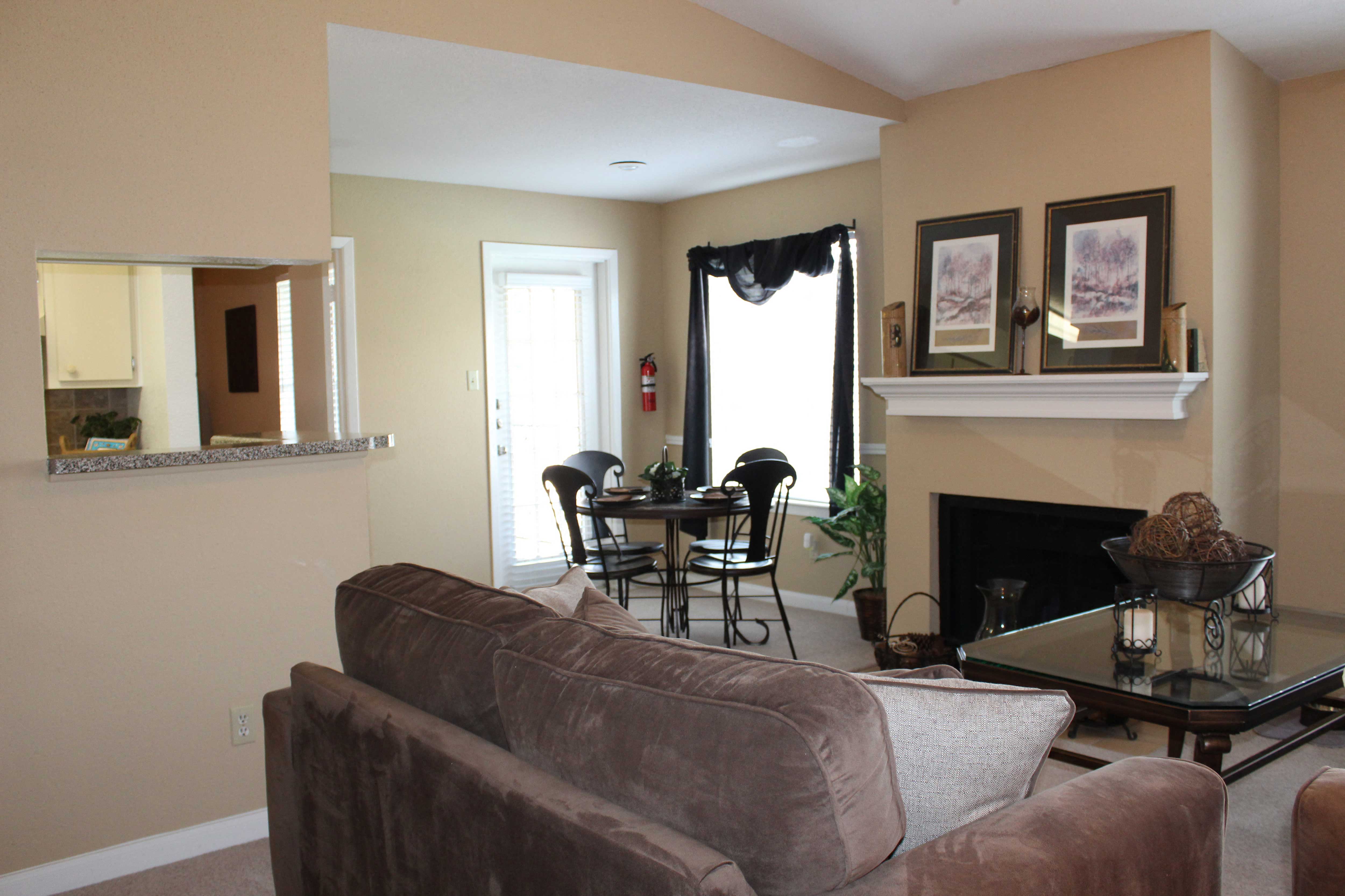 a living room with a couch and a table