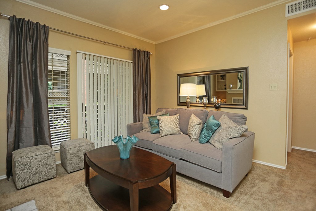 a living room with a couch and a table