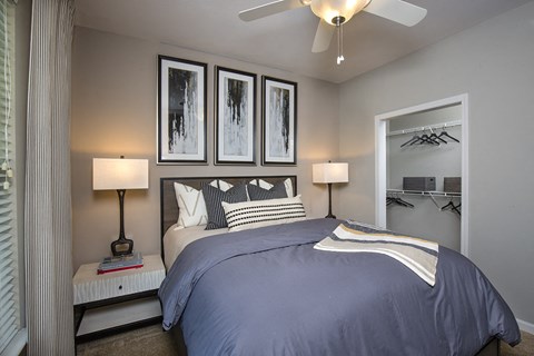 Indianapolis Lake Clearwater Apartments secondary bedroom with ceiling fan and walk-in closet