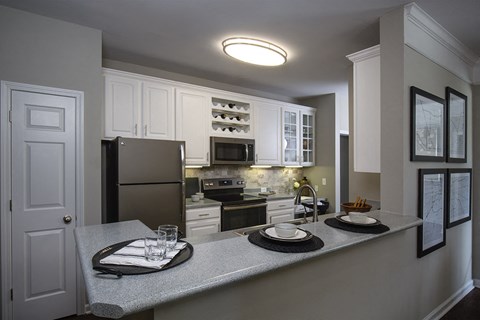 Indianapolis Lake Clearwater Apartments kitchen with slate appliance and breakfast nook