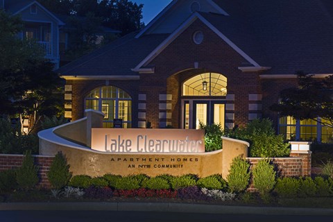 Indianapolis Lake Clearwater Apartments entrance sign at dusk