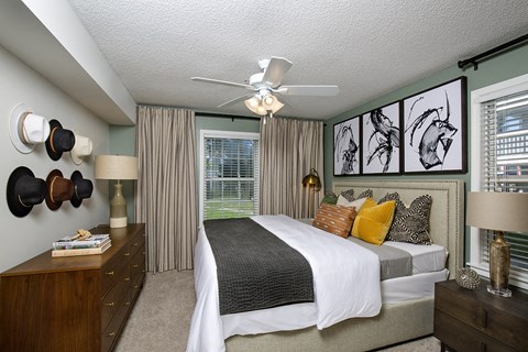 Indianapolis The Lakes Apartments primary bedroom with ceiling fan