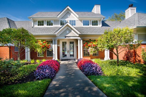 Indianapolis The Lakes Apartments leasing center entrance and beautiful landscaping