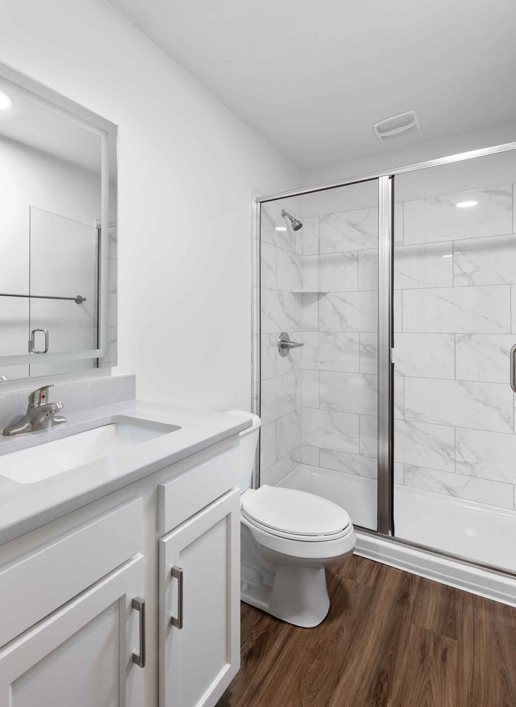 Hurstbourne Grand Apartments Louisville bathroom with walk-in shower and quartz vanity