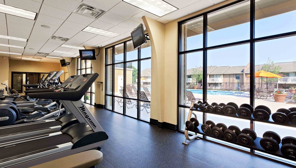 Louisville Plainview Apartments fitness center with cardio equipment and free weights