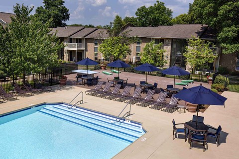 Louisville Plainview Apartments resort-style pool and sundeck with lounge seating