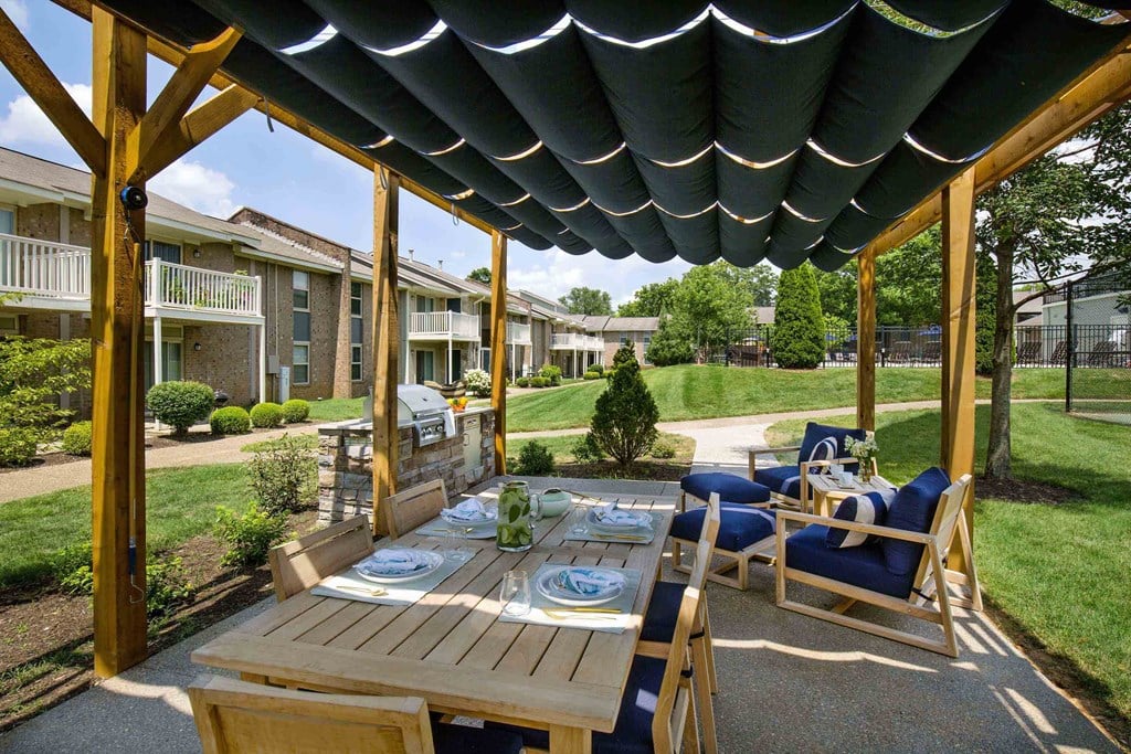 Louisville Plainview Apartments outdoor grills and shaded dining area