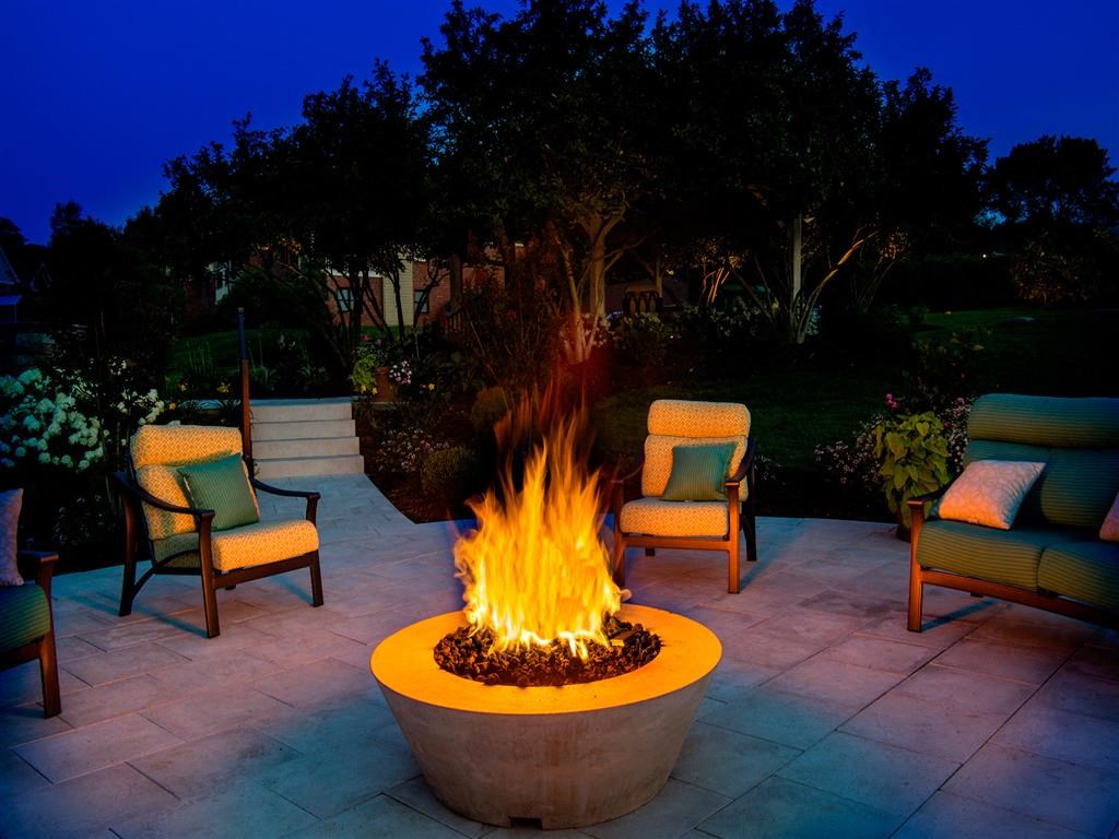 The Overlook at St. Thomas Apartments Louisville fire pit at dusk