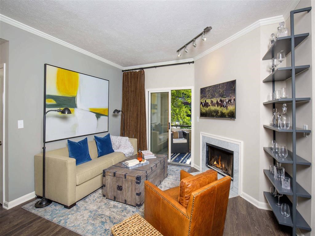 The Overlook at St. Thomas Apartments Louisville living room with fireplace