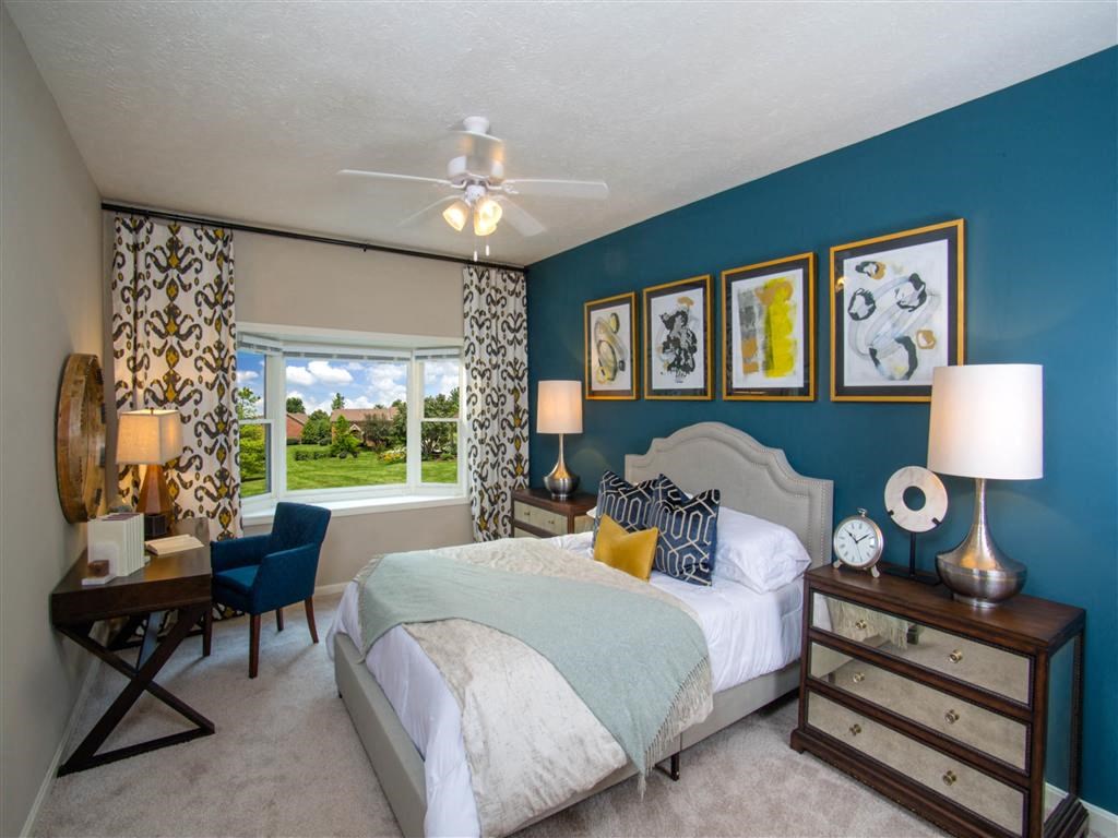 The Overlook at St. Thomas Apartments Louisville spacious primary bedroom with bay window