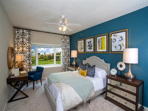 The Overlook at St. Thomas Apartments Louisville spacious primary bedroom with bay window