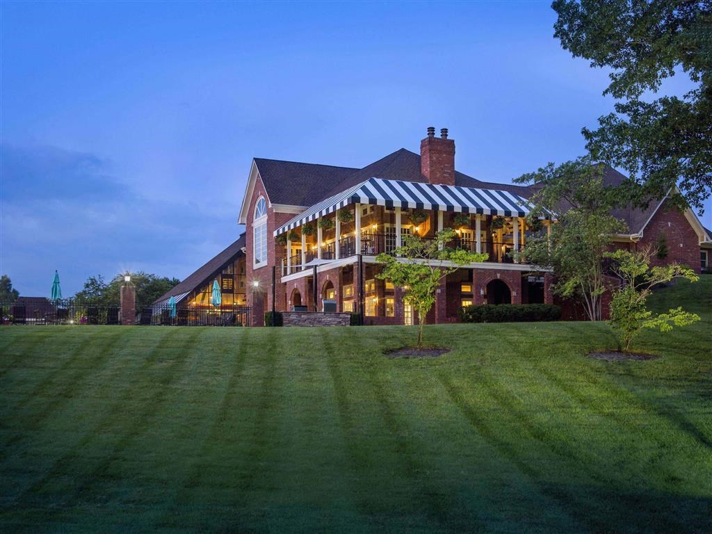 The Overlook at St. Thomas Apartments Louisville clubhouse at dusk