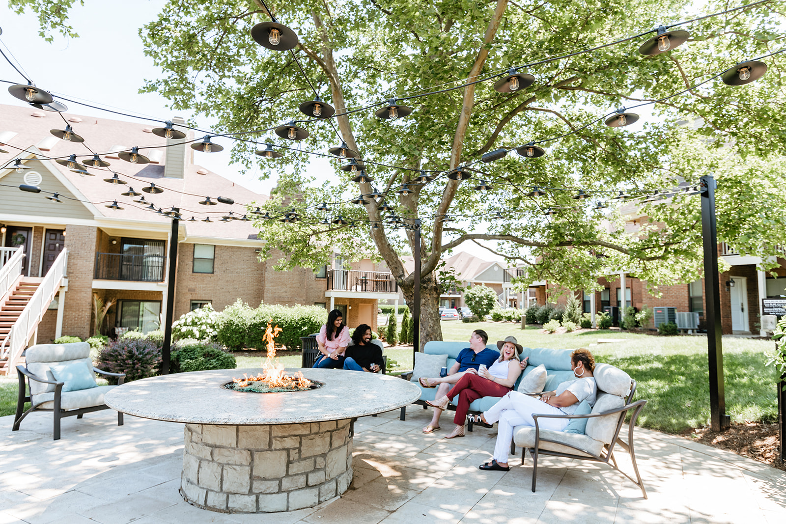 The Willows Apartments Louisville firepit with lounge seating