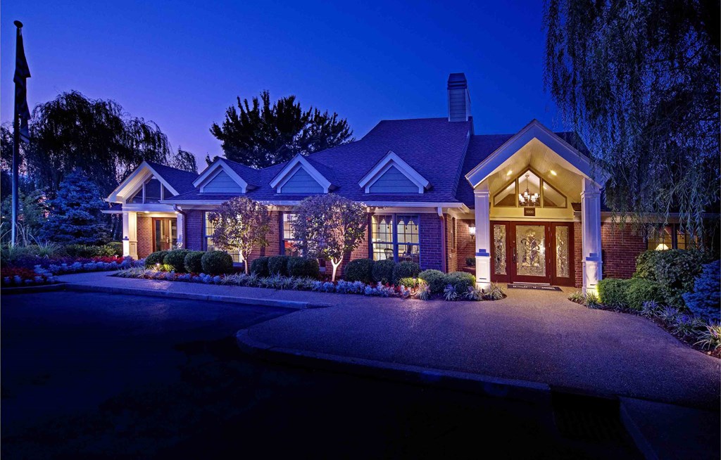 The Willows Apartments Louisville leasing center entrance at dusk