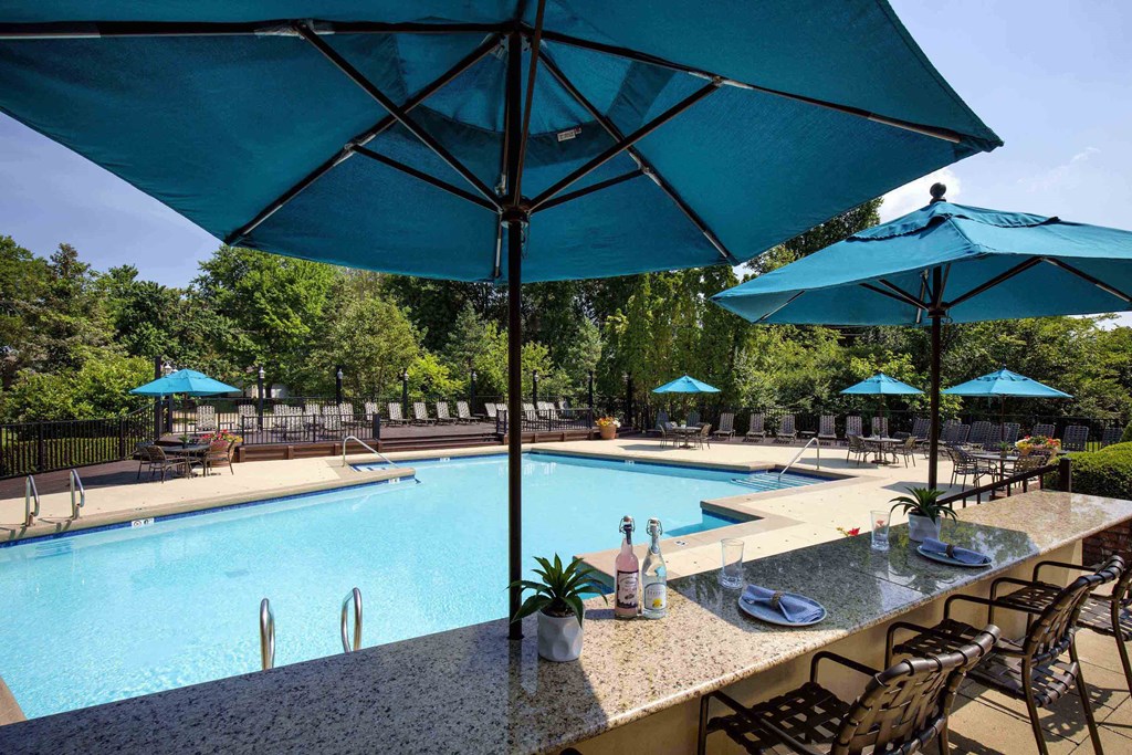The Willows Apartments Louisville poolside dining area