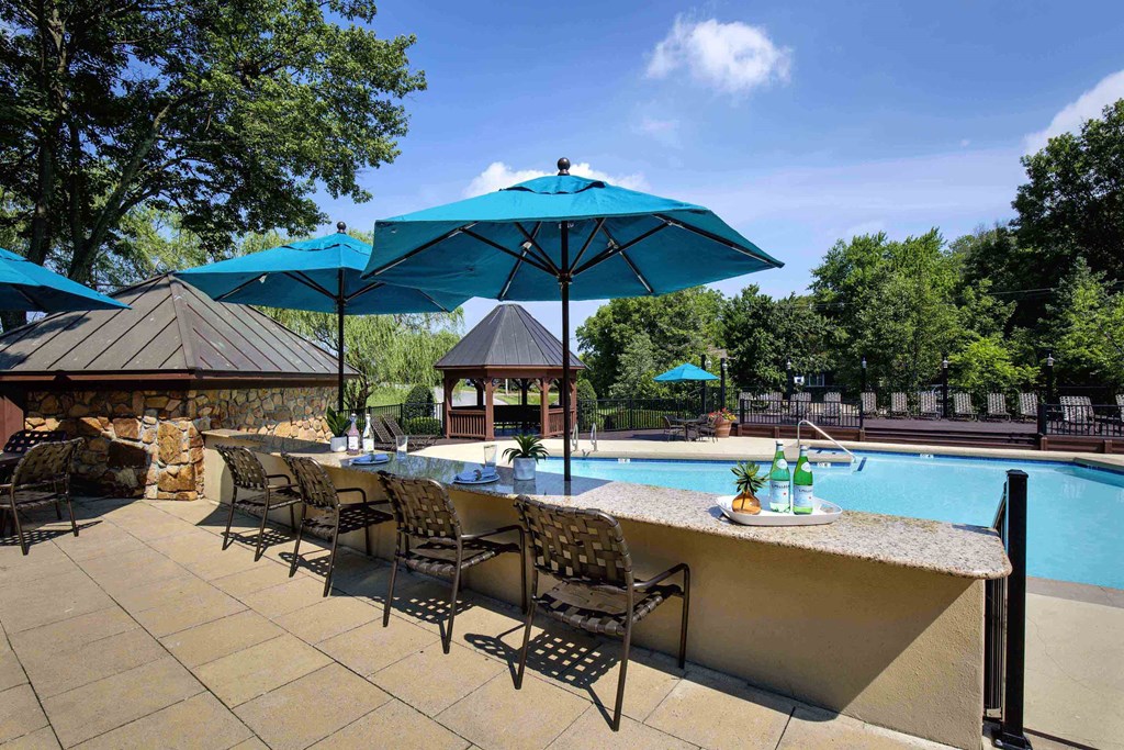 The Willows Apartments Louisville poolside dining area