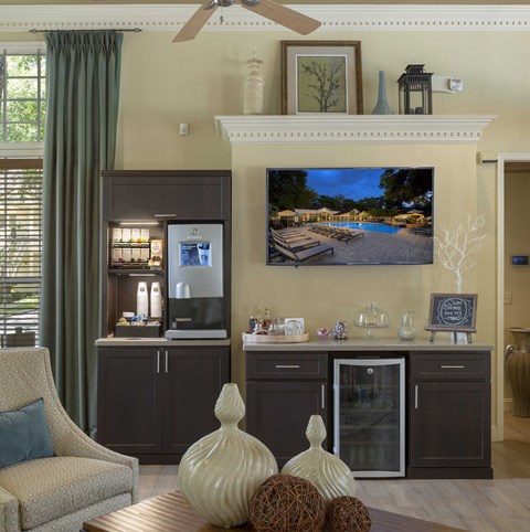 a view of a living room with a tv and a bar