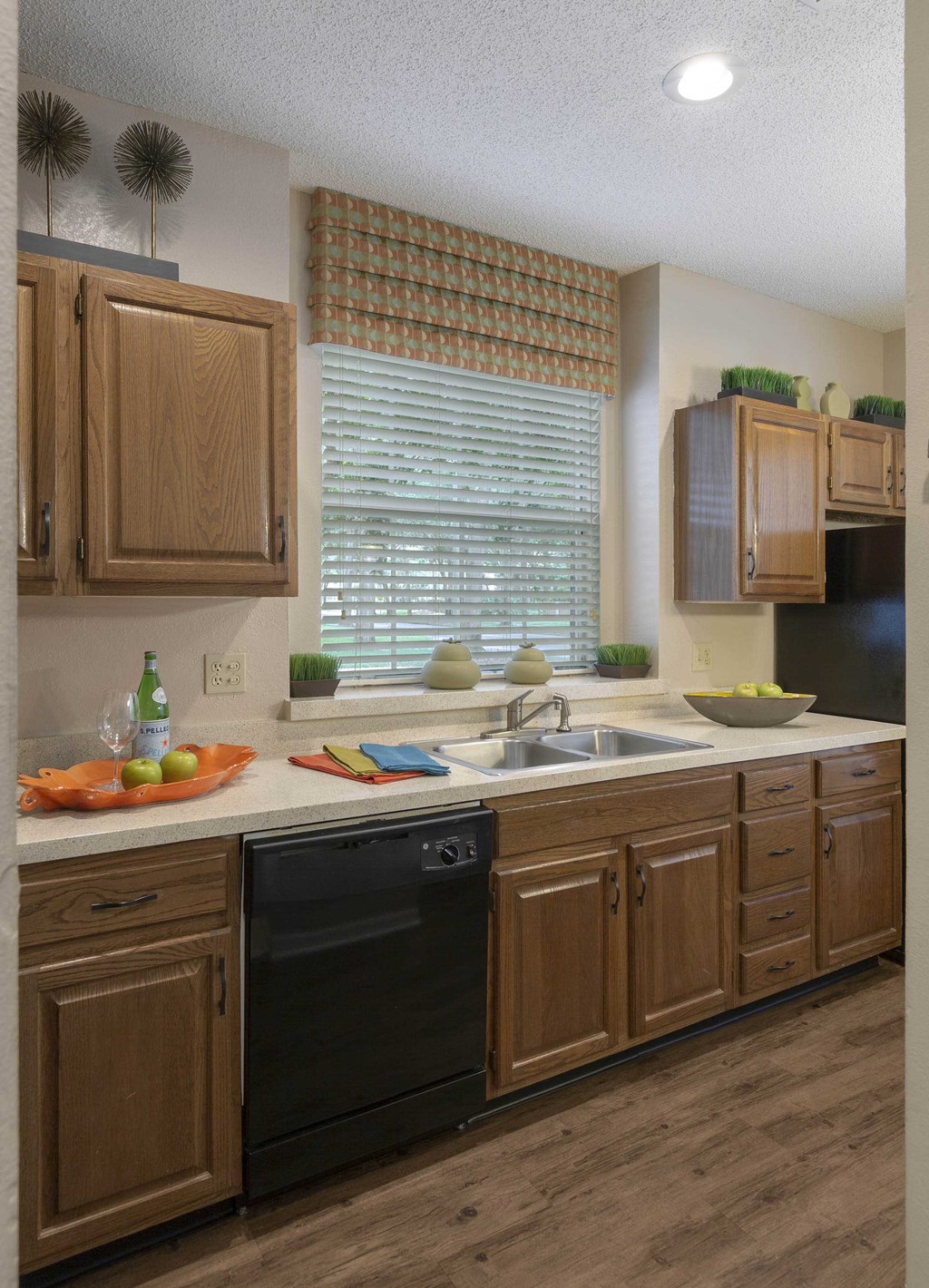 Longwood Sabal Park Apartments kitchen with solid oak cabinetry Longwood Sabal Park Apartments kitchen with solid oak cabinetry