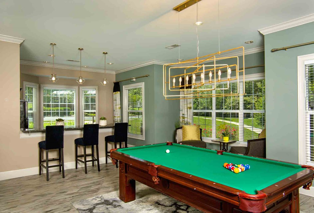 Creek's Edge Apartments Richmond Virginia entertainment lounge with pool table, games, and TVs