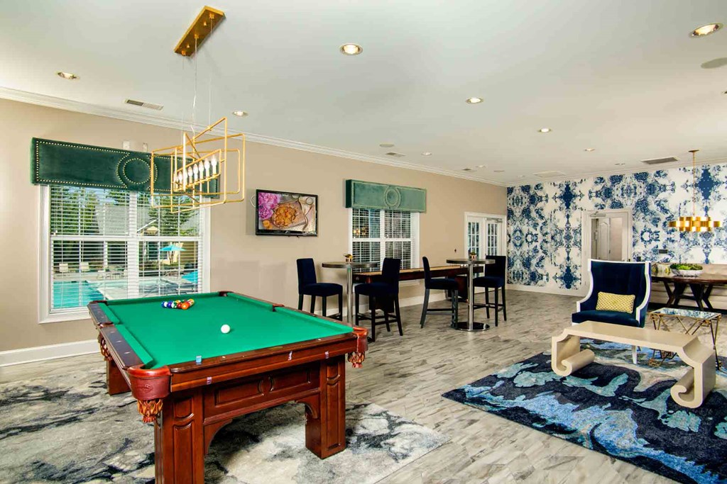Creek's Edge Apartments Richmond Virginia entertainment lounge with pool table, games, and TVs