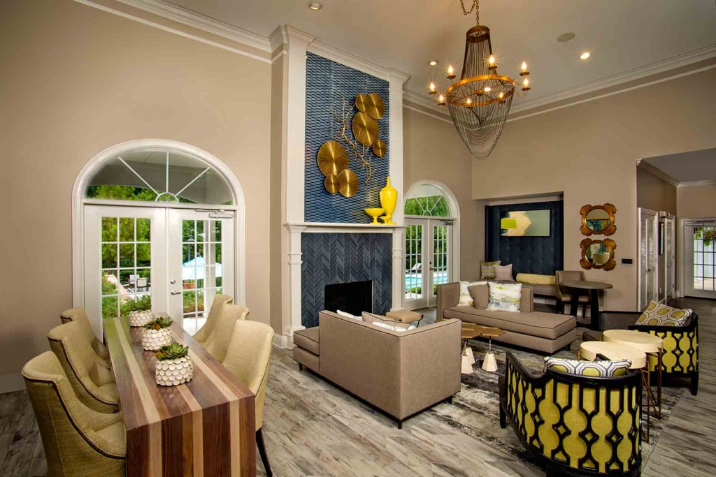 Creek's Edge Apartments Richmond Virginia resident lounge with fireplace and plush seating