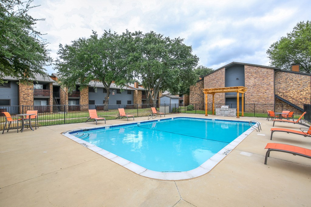 our apartments have a resort style pool with chairs