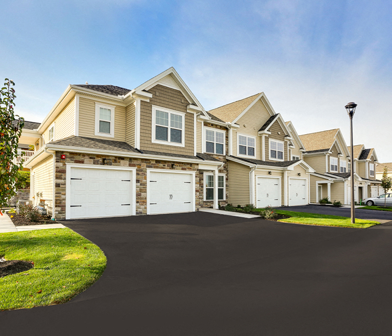 a house with a driveway in front of it