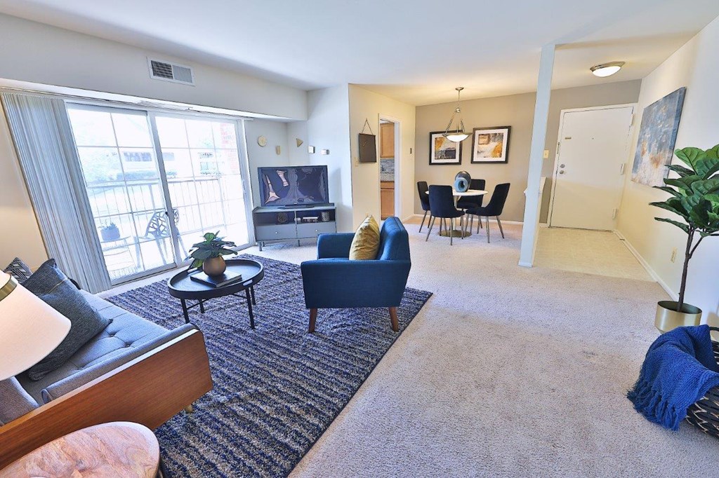 a living room with a couch and a tv