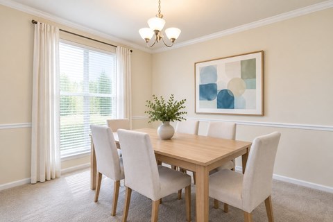 A dining room with a wooden table and chairs.