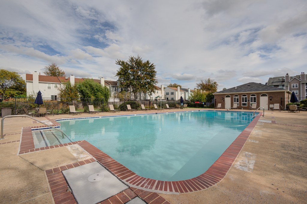 the preserve at ballantyne commons community swimming pool with apartment buildings
