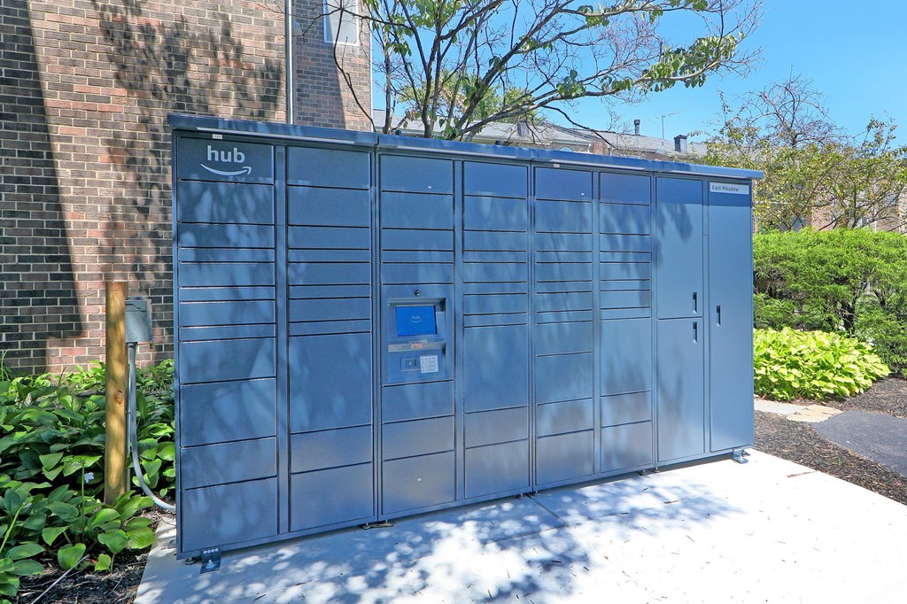 a blue metal building with a meter on the side of it