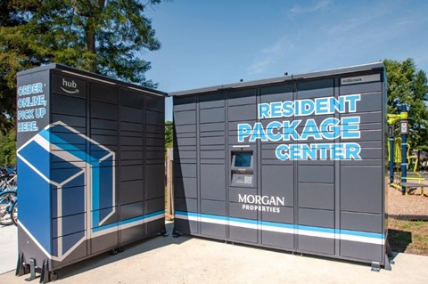 a small building with a toilet and a sign on it