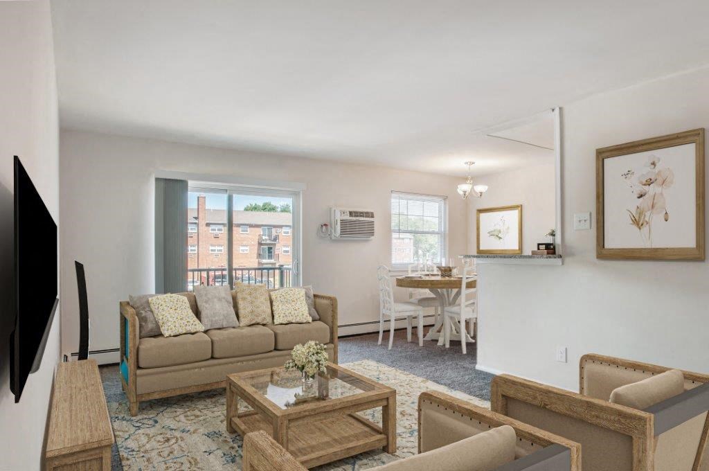 a living room with a couch and a table