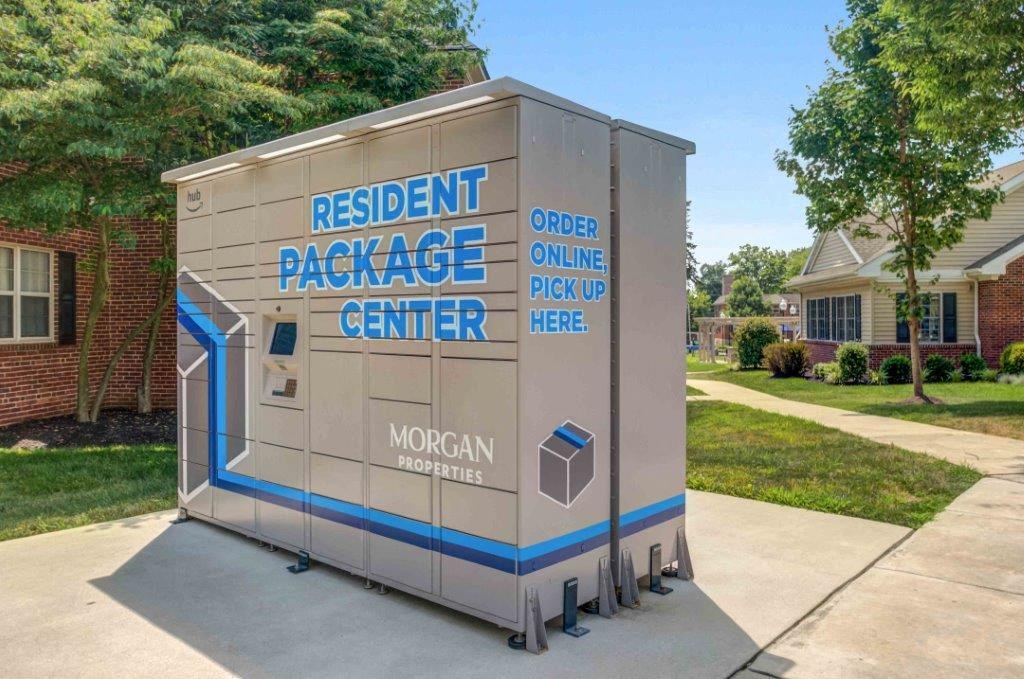 a portable building on a sidewalk in front of a house