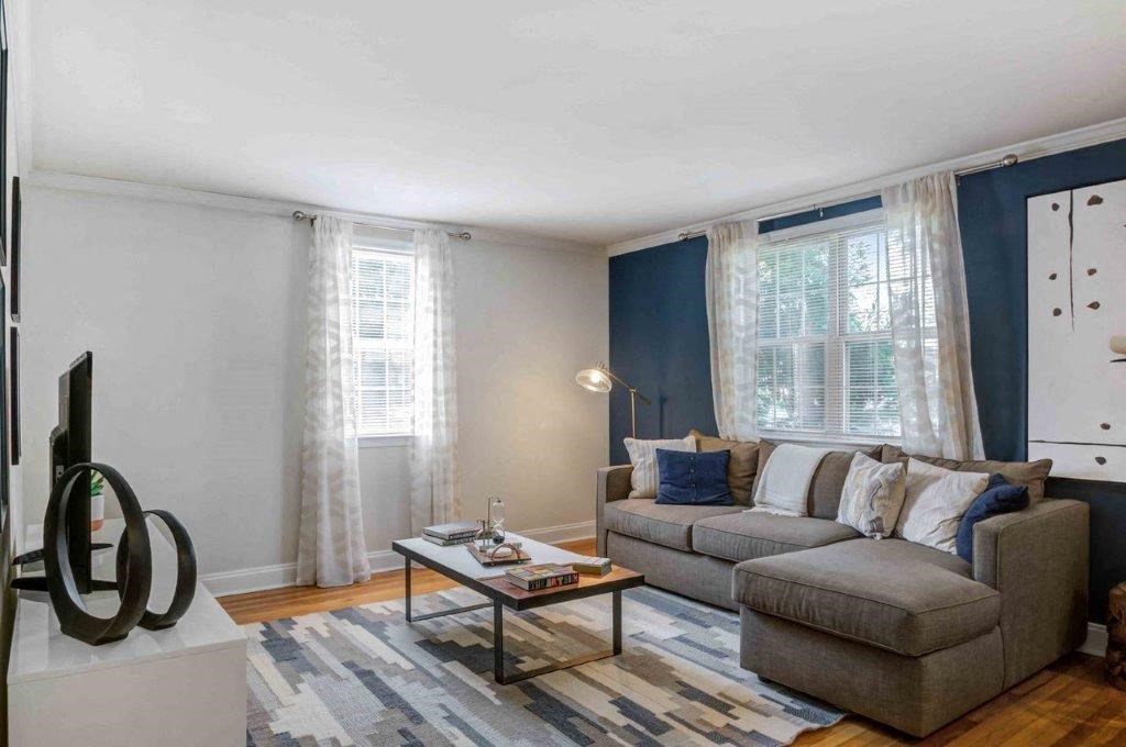 a living room with a couch and a coffee table