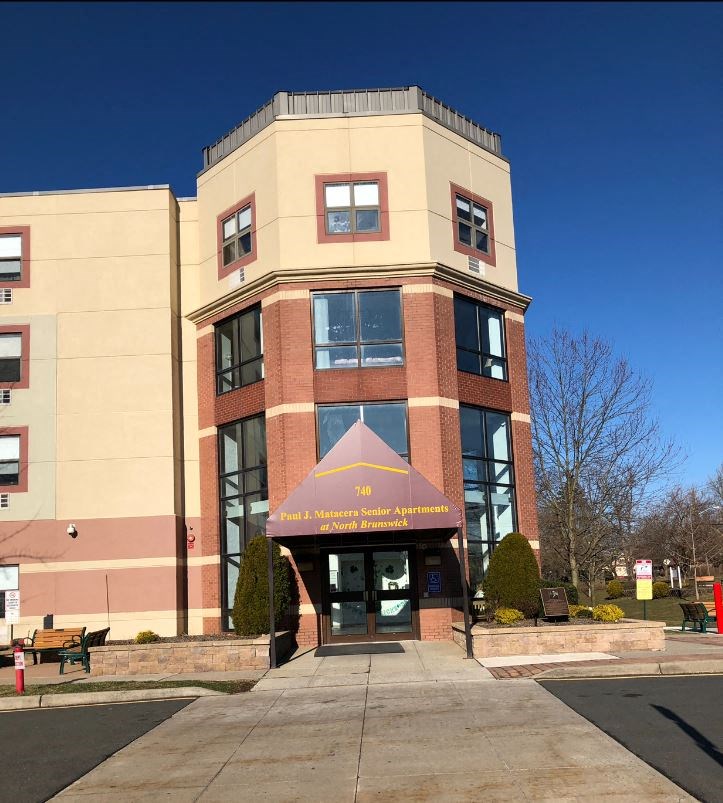 a large building with a sign in front of it