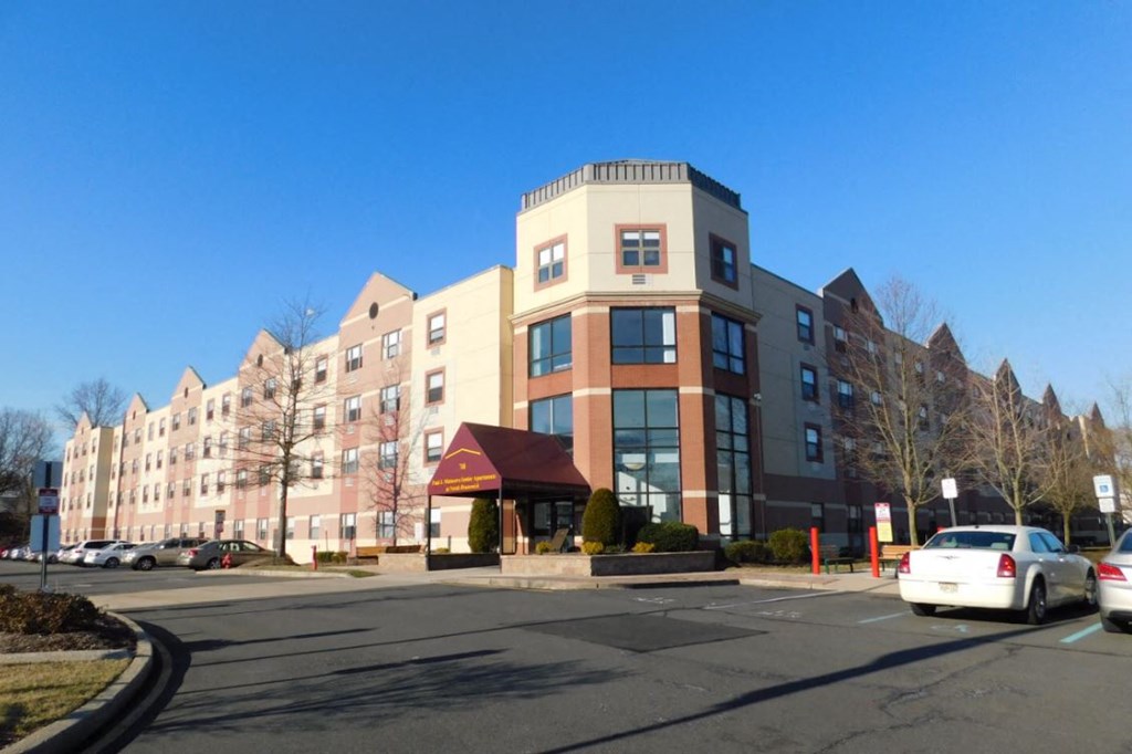 a building on the corner of a city street