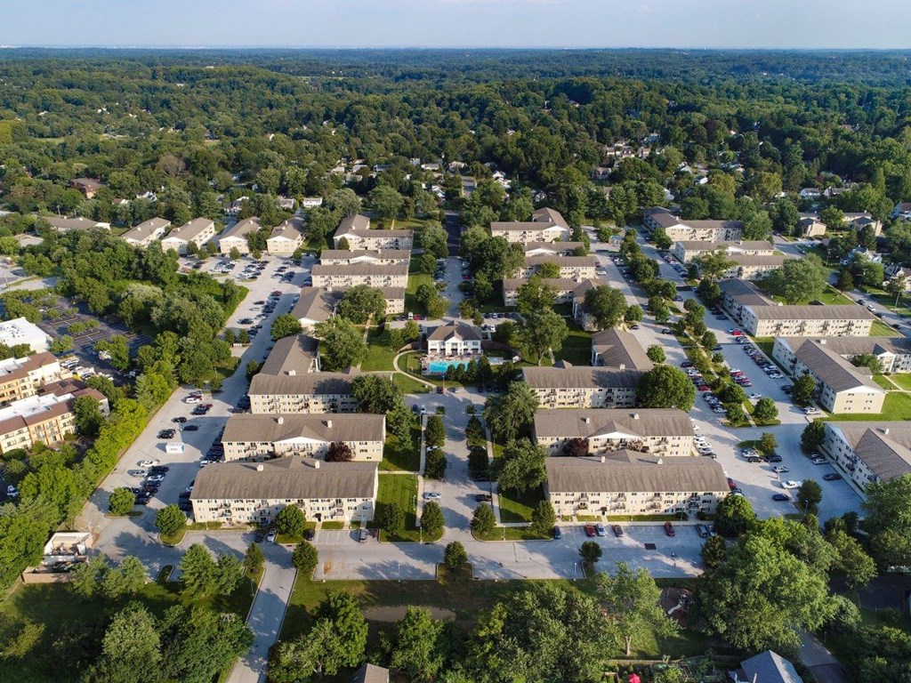an aerial view of a neighborhood of houses and trees