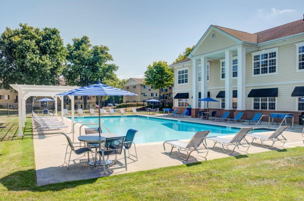 our apartments offer a swimming pool with chairs and umbrellas