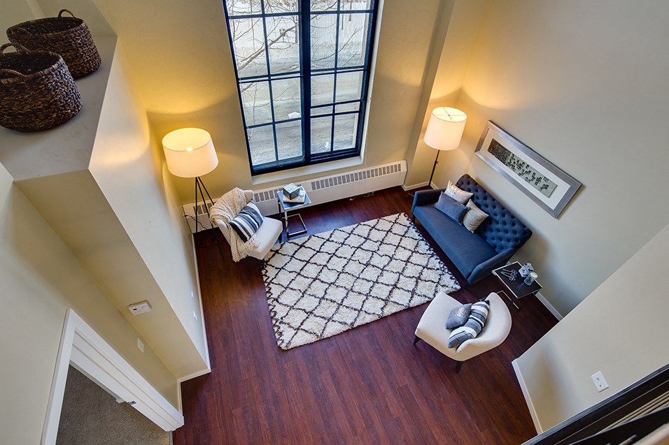 an overhead view of a living room with a large window