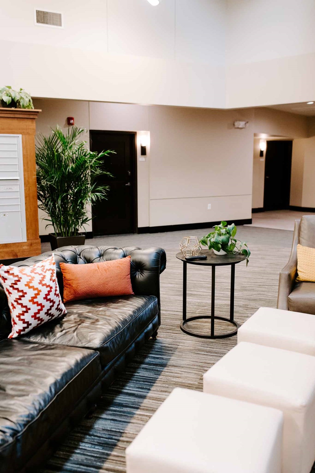 a living room with couches and a table