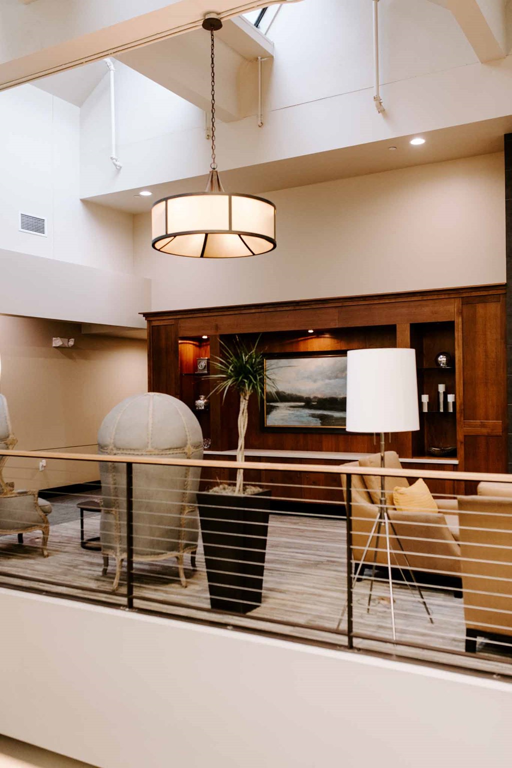 a view of a lobby with a table and chairs